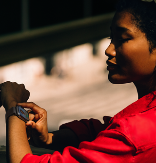 A person receives an incoming phone call on their Apple Watch Series 11