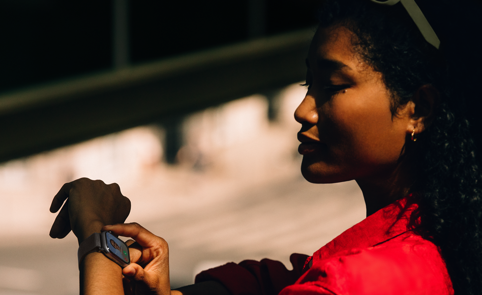 A person receives an incoming phone call on their Apple Watch Series 11